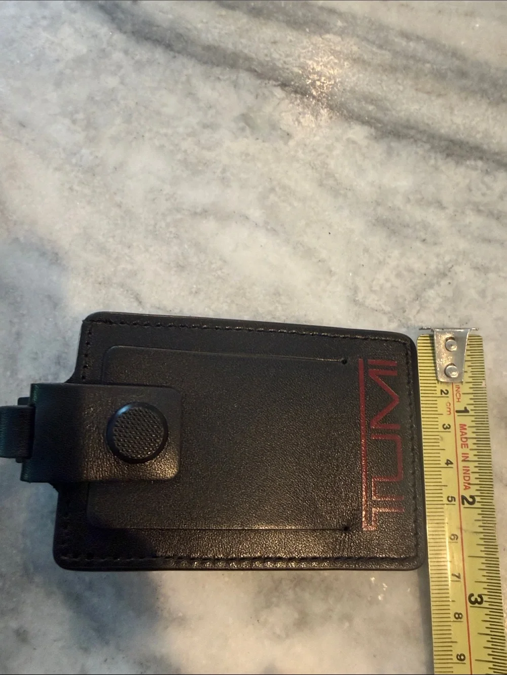 TUMI Genuine Leather Luggage Tag in Black with Red Logo